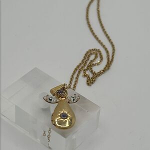 Vintage gold tone angel pendant locket birthstone necklace - purple rhinestone
